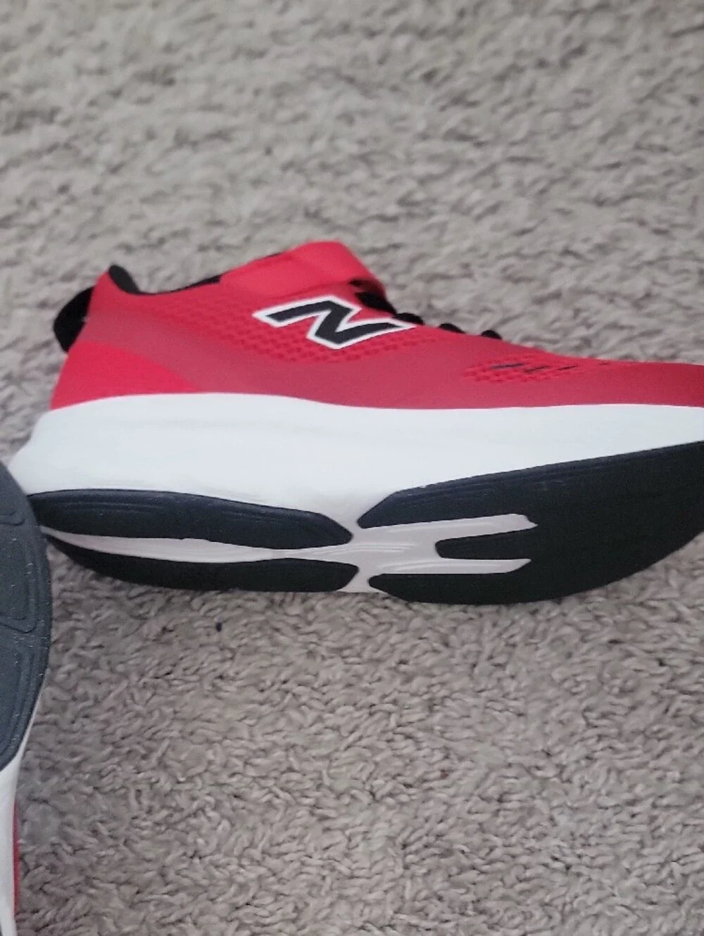 New Balance Kids Red and Black Sneakers